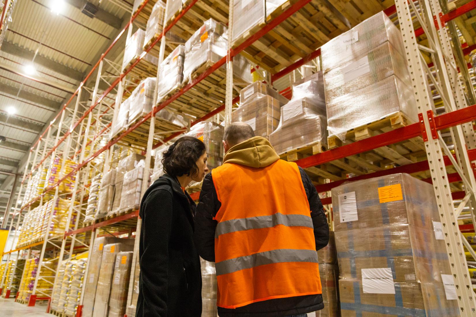UNFPA’s Senior Regional Coordinator Oksana Andrushkiv (left) reviews an inventory of emergency reproductive health supplies stored at a warehouse in Lviv 