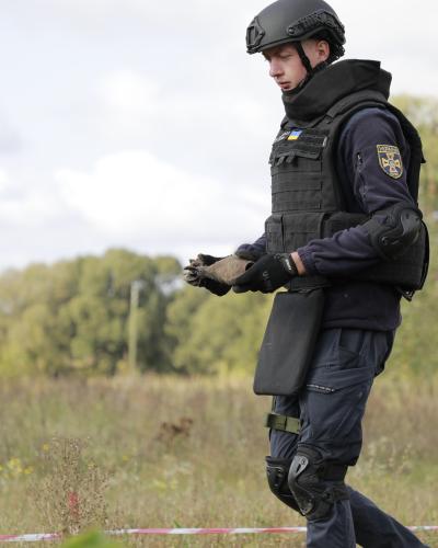 Picture of an officer operating a drone 