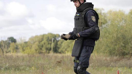 Picture of an officer operating a drone 